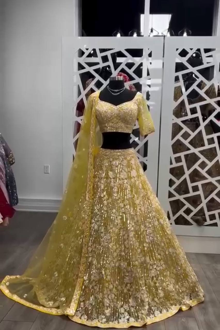 Net Embroidered Wedding Wear Yellow Lehenga Choli