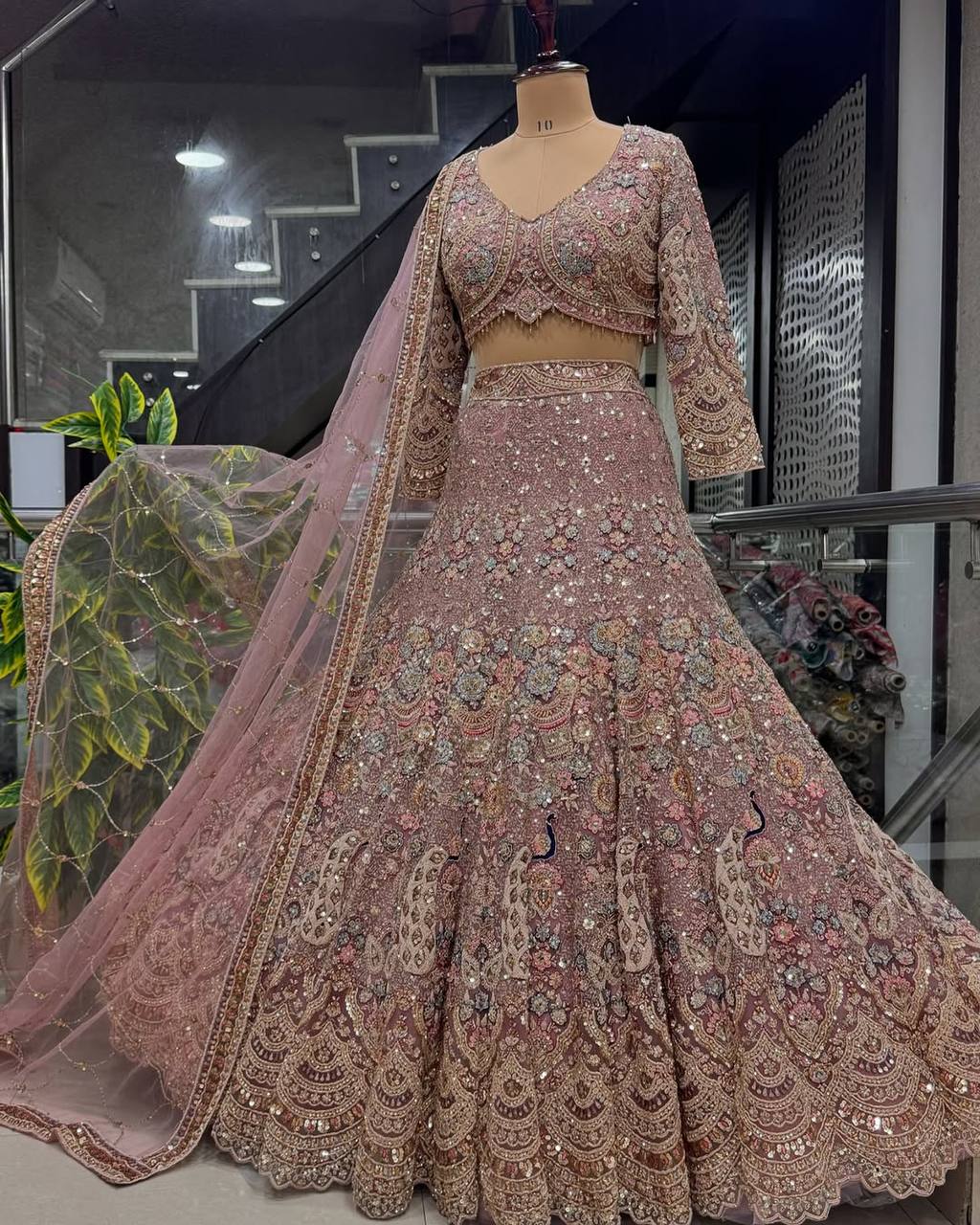 Bridal Wear Net Embroidered Light Pink Lehenga Choli