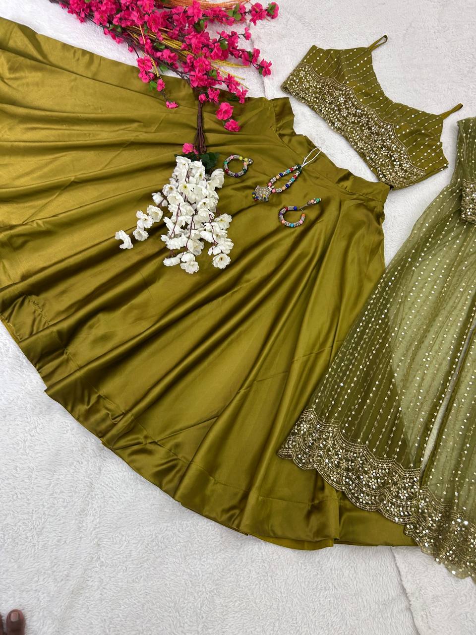 Party Wear Silk Green Lehenga Choli With Shrug